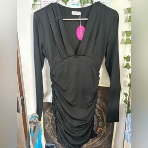 Black V-Cut slim dress, can be worn short or long, new with tags.